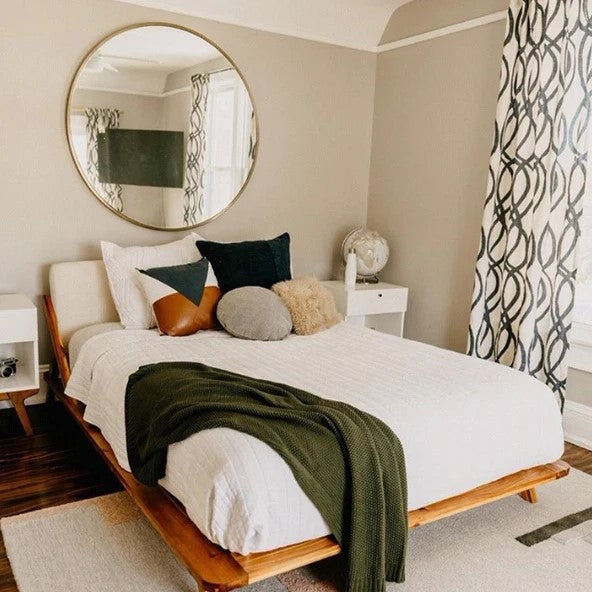 Miroir rond avec cadre Julieta en laiton ou en acier sur mesure