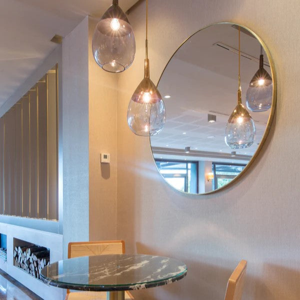 Miroir rond avec cadre Julieta en laiton ou en acier sur mesure